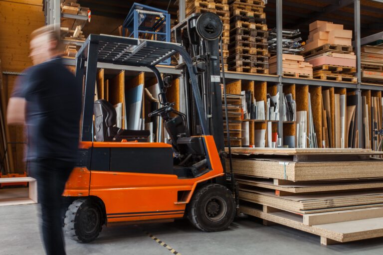 forklift carrying inventory
