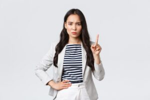 business-finance-employment-female-successful-entrepreneurs-concept-angry-serious-looking-businesswoman-teaching-employee-lesson-shaking-finger-prohibition-scolding-person (1)-min